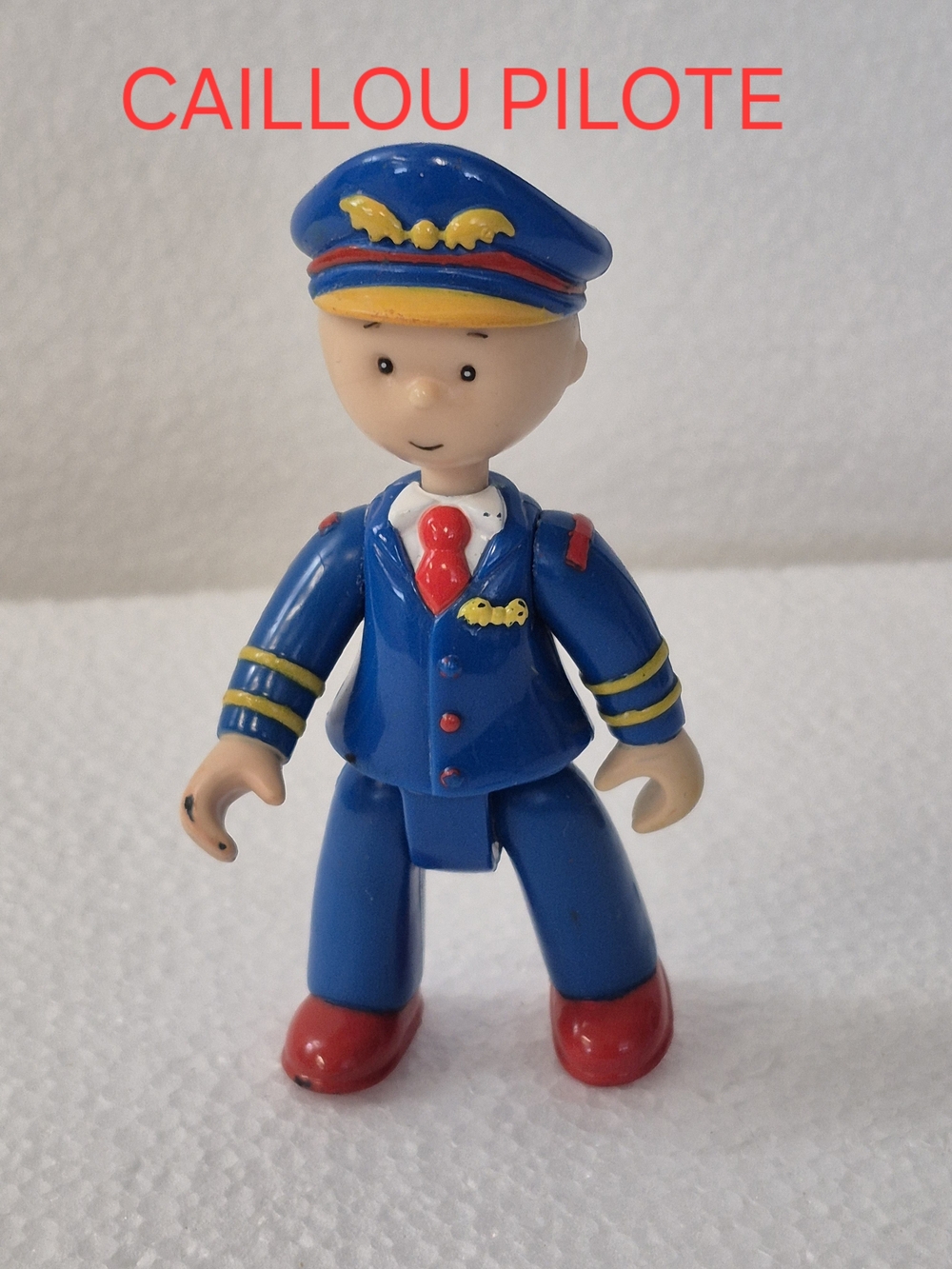 Caillou Figurine. Pilote Caillou.Action Figurine Red and Blue